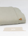 Übertuch in der Farbe "jade", zusammenelegt und vor weißem Hintergrund.